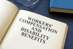 Open Workers Compensation and Disability Benefits law book concept